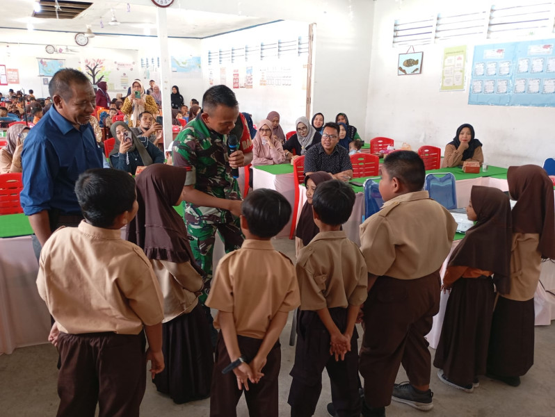 Personil Koramil 06/Kateman Hadiri Giat Sosialisasi Anti Perundungan Anak